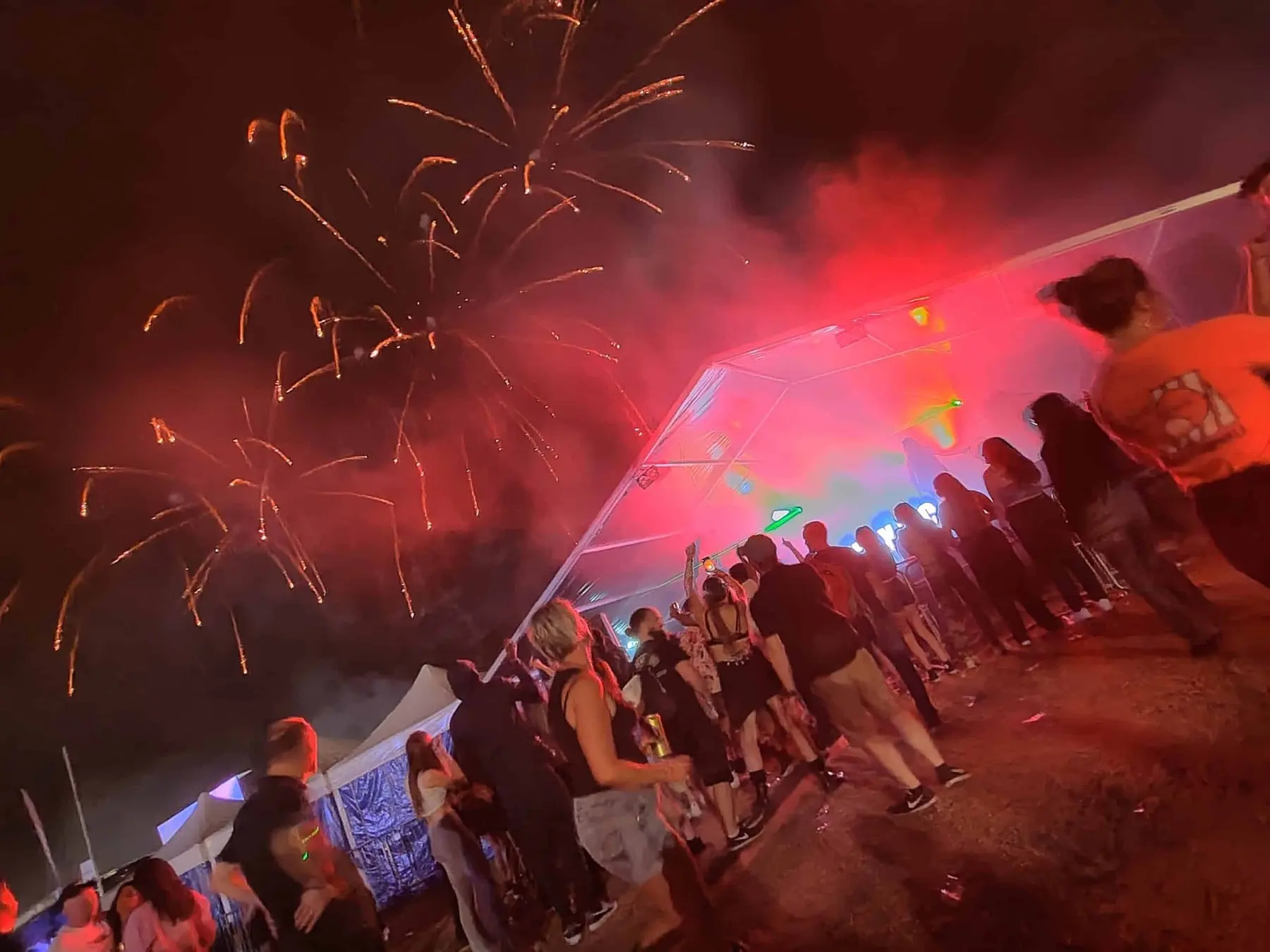 Festival production with fireworks and stage lighting